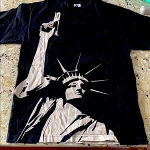 Statue of Liberty holding gun T-shirt